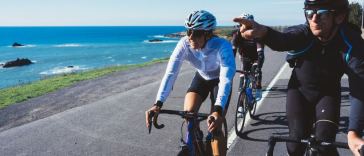 cyclists riding bikes outdoors