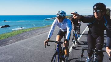 cyclists riding bikes outdoors