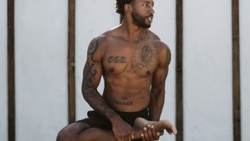 man doing yoga stretch