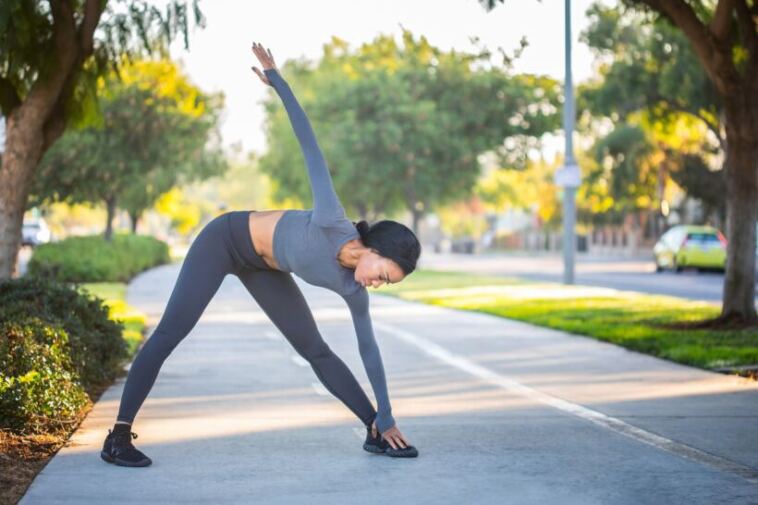 fit woman exercising outdoors