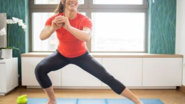 woman exercising at home
